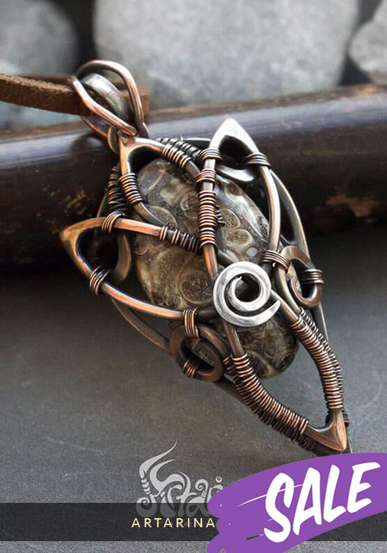 Copper and silver wrapped gemstone