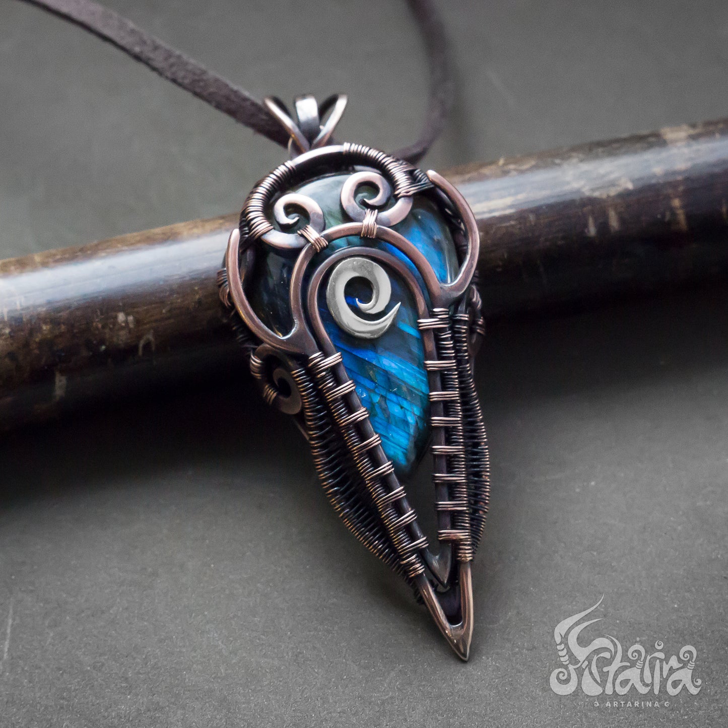 Wire wrapped jewelry for men. Intricate filigree hand weaved pendant with blue stone. Dark brown patina freeform necklace