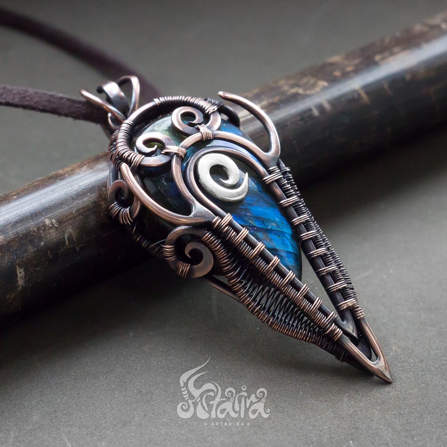Wire wrapped jewelry for men. Intricate filigree hand weaved pendant with blue stone. Dark brown patina freeform necklace
