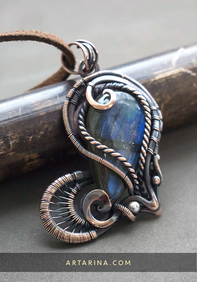 copper heart with blue gemstone