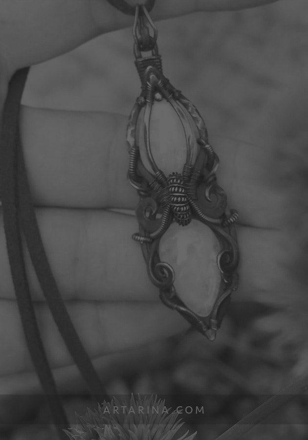Two moonstones wire wrapped pendant