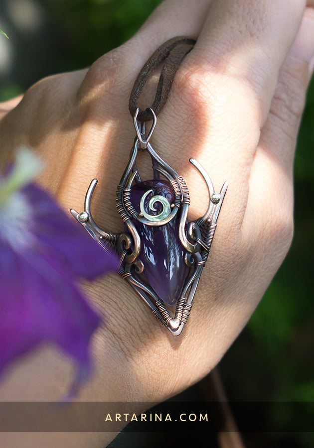 Wire wrapped stone pendent