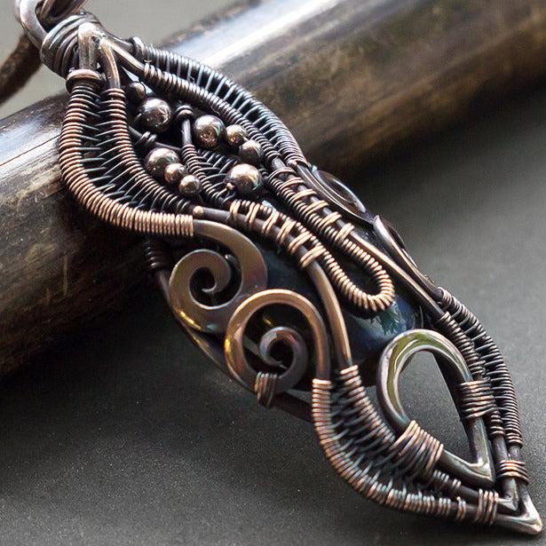 Alchemic magical necklace with stone. Secret pendulum item for sale. Laboratory of the alchemist necklace