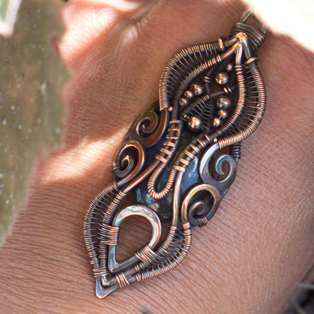 Alchemic magical necklace with stone. Secret pendulum item for sale. Laboratory of the alchemist necklace