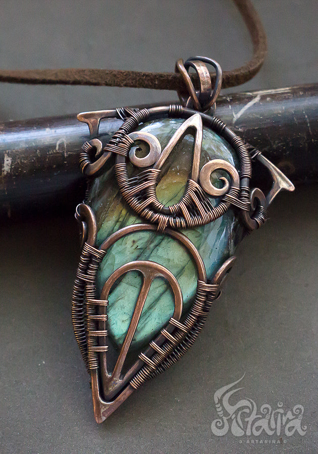 Wire wrapped pendant. Copper wire wrap stone pendant