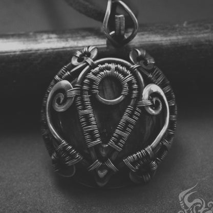 Alchemy leicester gothic necklace. Roud medallion magical jewelry. Custom made jewelry store