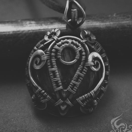 Alchemy leicester gothic necklace. Roud medallion magical jewelry. Custom made jewelry store