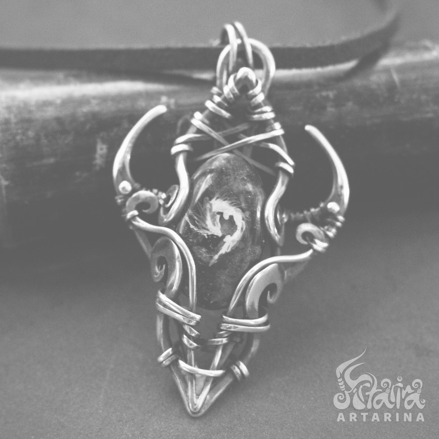 Silver wire wrapped dragon pendant