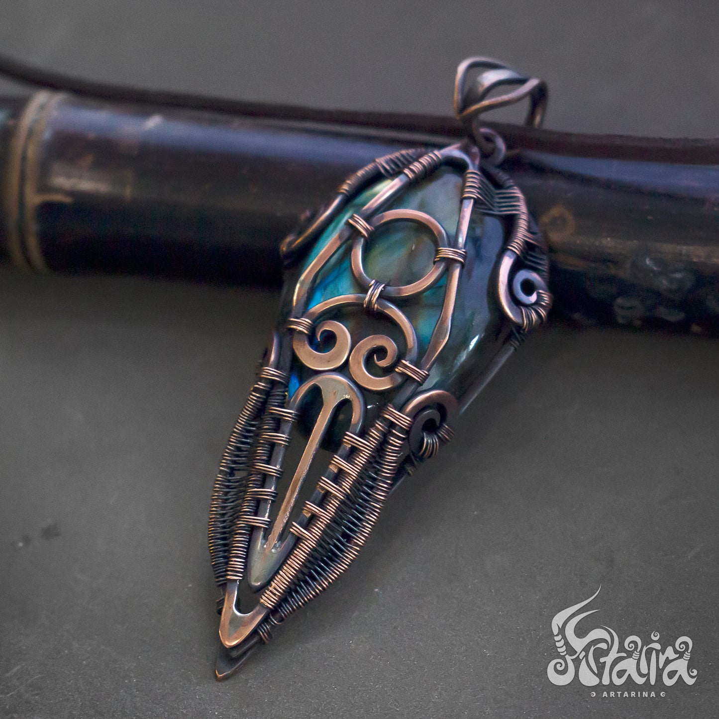 Wire wrapped jewelry for men. Intricate filigree hand weaved pendant with blue and green stone. Dark brown patina freeform necklace