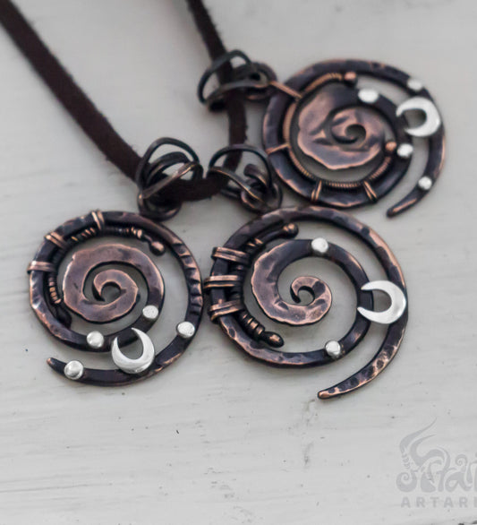 Rustic hand forged wire wrapped moon spirals