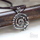 Handmade hand forged wire wrapped industrial style spiral necklace. pic 2