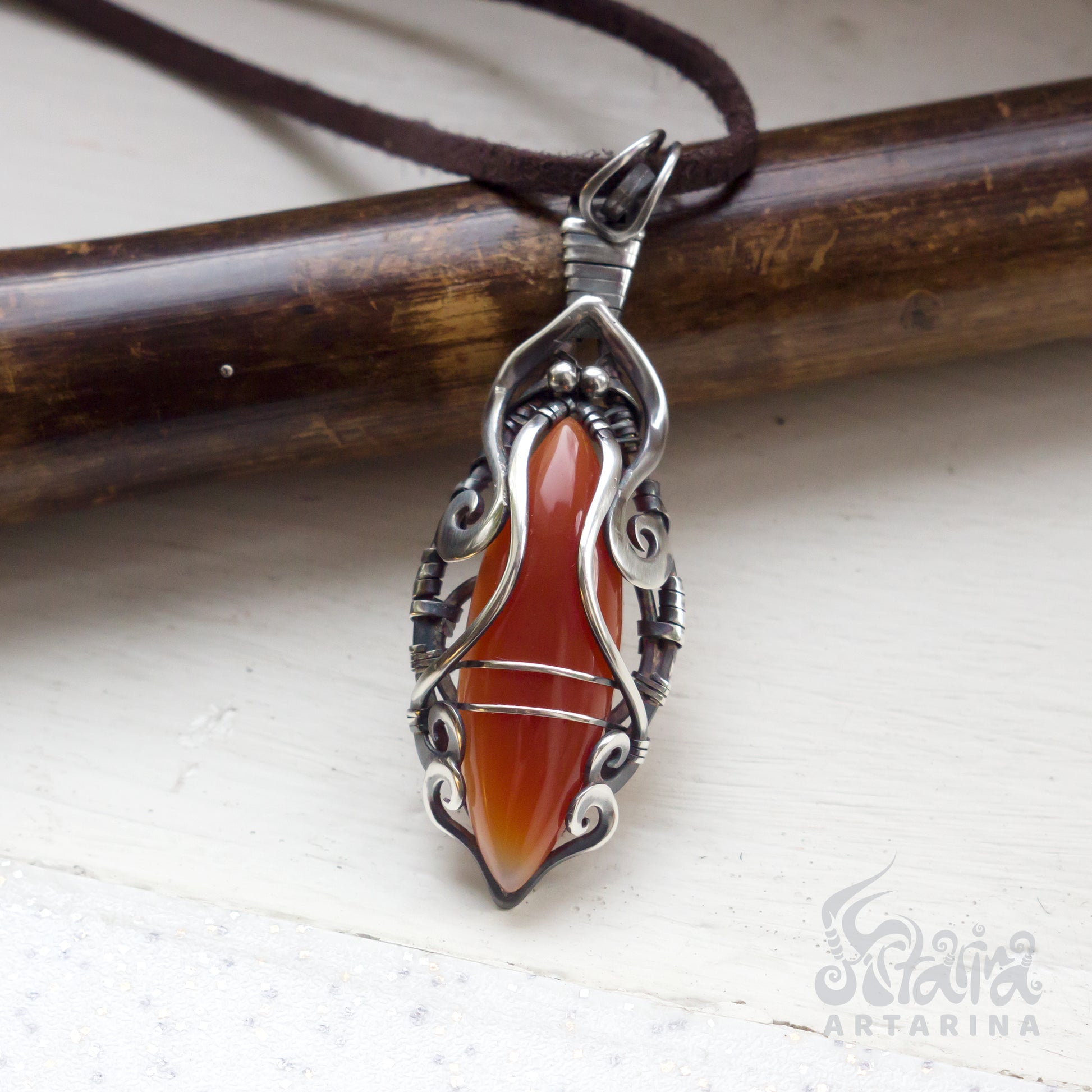 Solid sterling silver handmade wire wrapped necklace with carnelian stone. pic1
