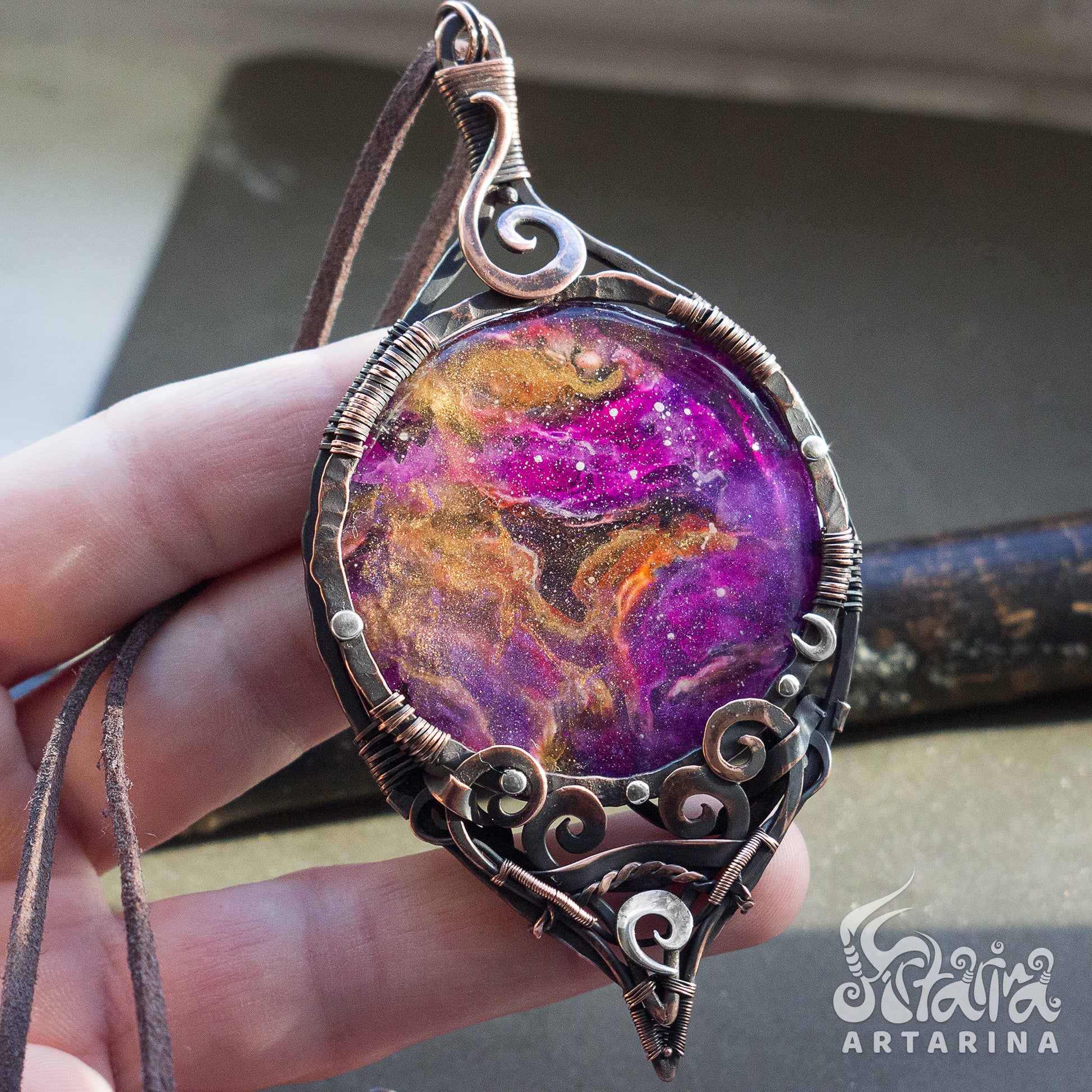Handcrafted copper necklace featuring a stunning resin cabochon hand-painted to resemble a mesmerizing purple nebula in space pic 1
