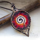 Large, bold round necklace with unique handmade design, featuring a painted cabochon with a white burning spiral pattern for a celestial and elegant look pic 3