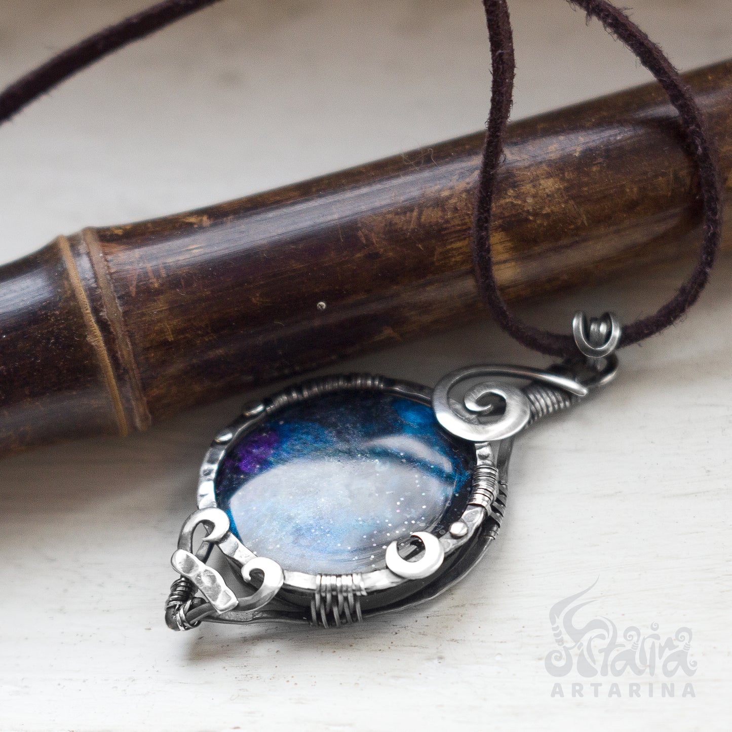 Handmade silver pendant with a cosmic stellar nebula design and a hand-painted night sky epoxy resin cabochon. pic 2