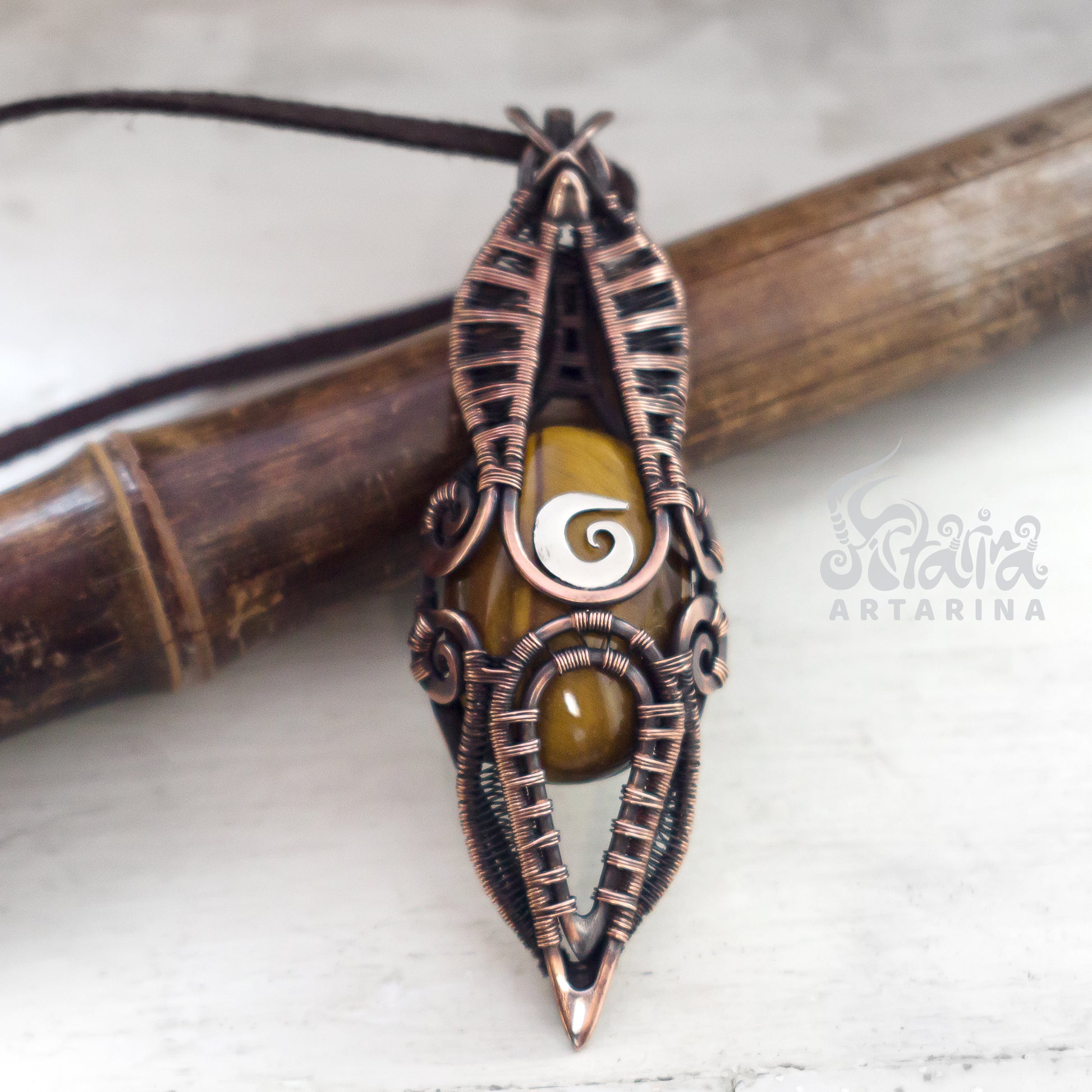 Handmade copper wire-wrapped necklace with a unique Tiger's Eye stone pendant pic1