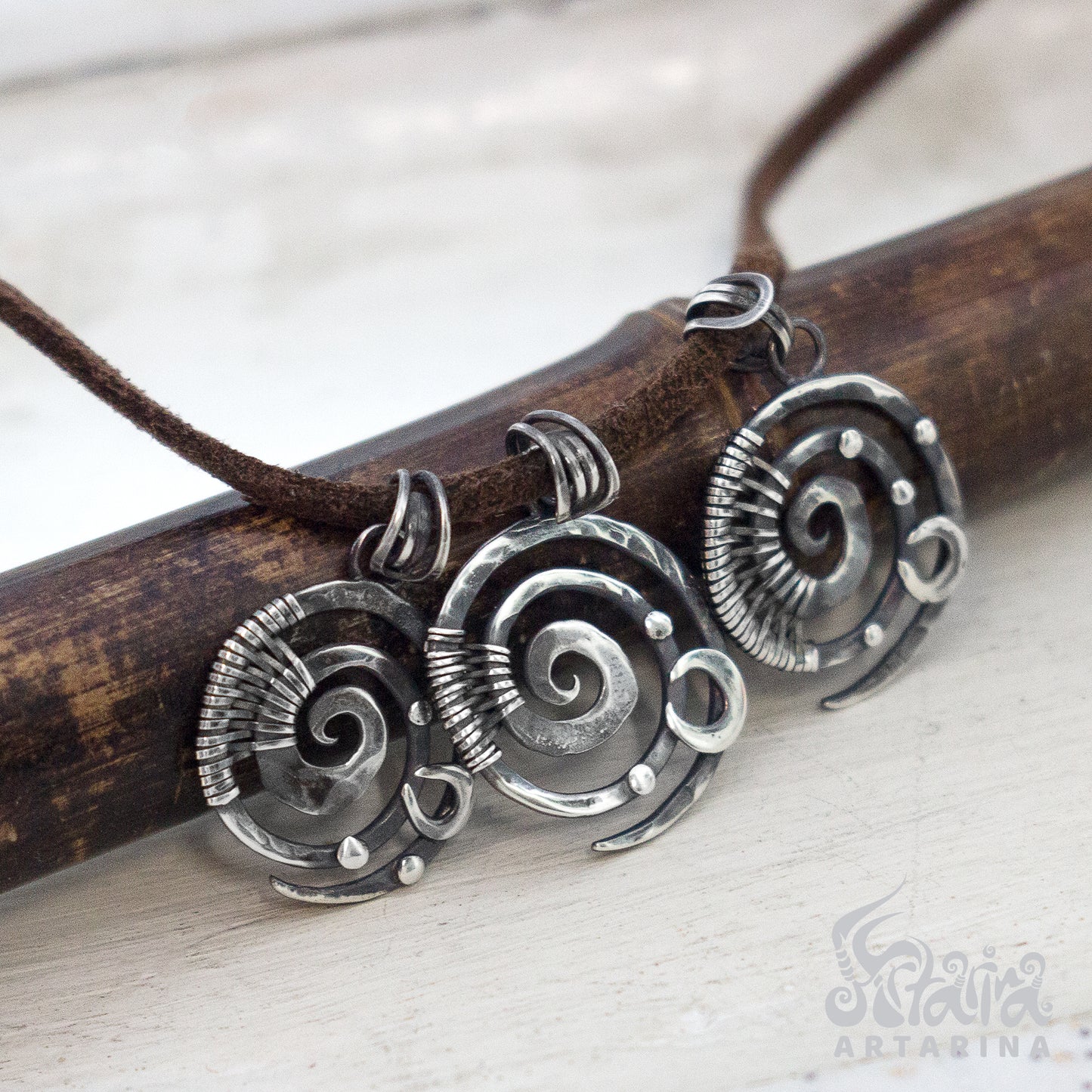 Simple minimalist spiral and moon wire wrapped silver necklace