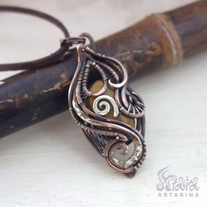 Tigerseye pendant heady wire wrapped astral realms crystal oracle magic talisman wire wrapped pendant elemental spirit companion breathing necklace anxiety relief liminal space crystal shop artarina