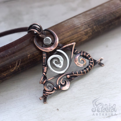 Wire wrapped third eye magical talisman necklace. Unique spiral wrework pendant