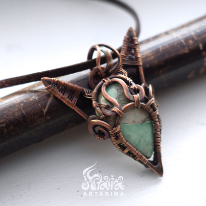 Magic grimoire witch necklace.