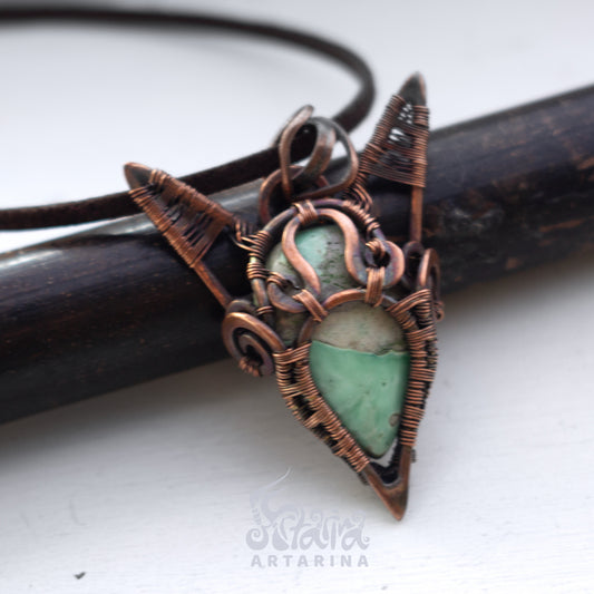 Magic grimoire witch necklace.