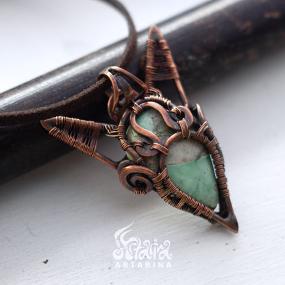 Magic grimoire witch necklace.
