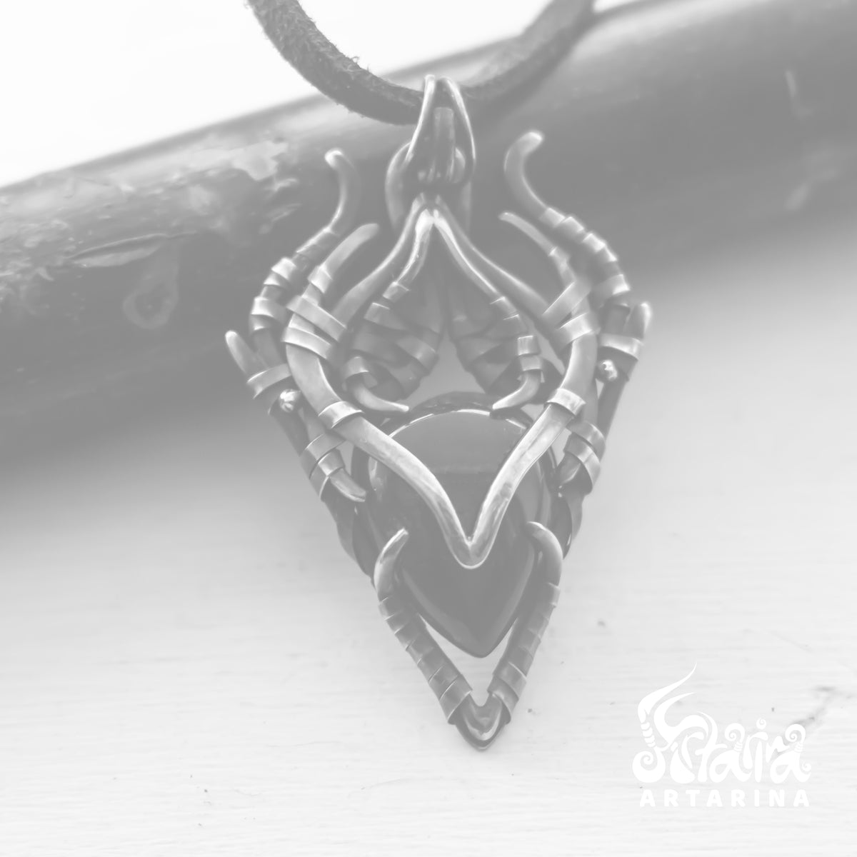 Obsidian dragon pendant. Ancient energy necklace