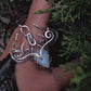 Carved moonstone fairy druid silver necklace. Wire wrapped silver pendant with stone