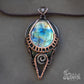 Wire wrapped jewelry for men. Intricate filigree hand weaved pendant with blue and green stone. Dark brown patina freeform necklace 