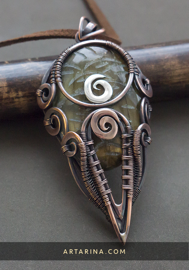 Carved gemstone pendant
