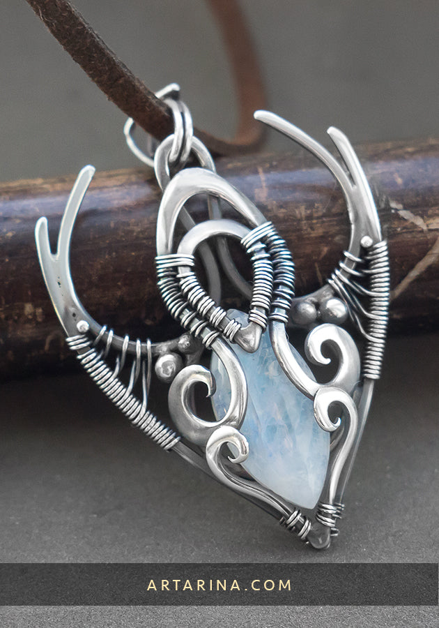 magical elves white moonstone silver pendant