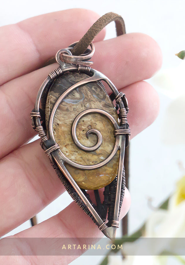 Copper necklace with petrified wood cabochon