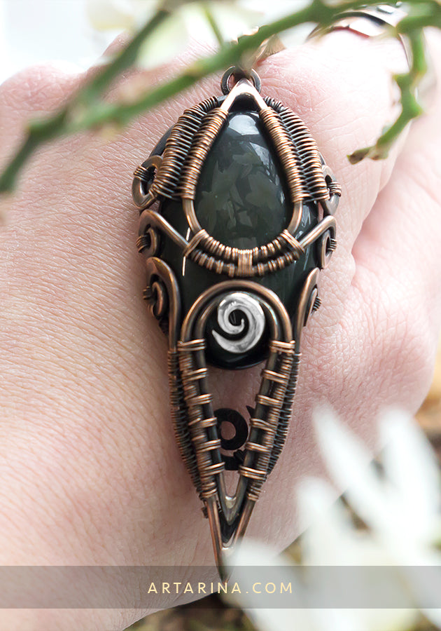 Wire wrapped obsidian gemstone