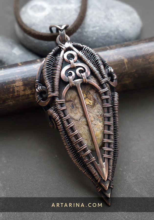 Wire wrapped petrified wood pendant