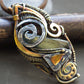 Brass and silver heady wirewrapped pendant