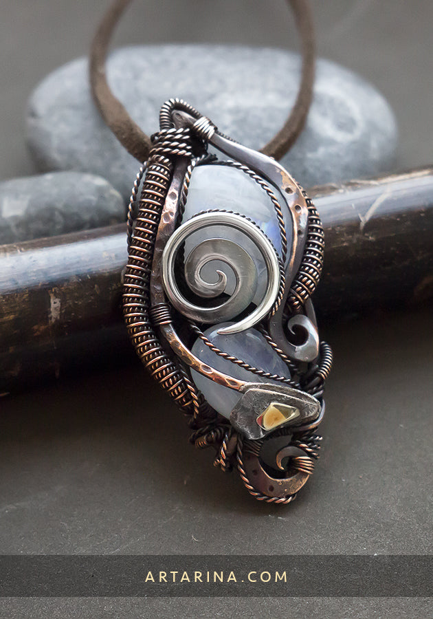 Heady wire wrapped moonstones pendant
