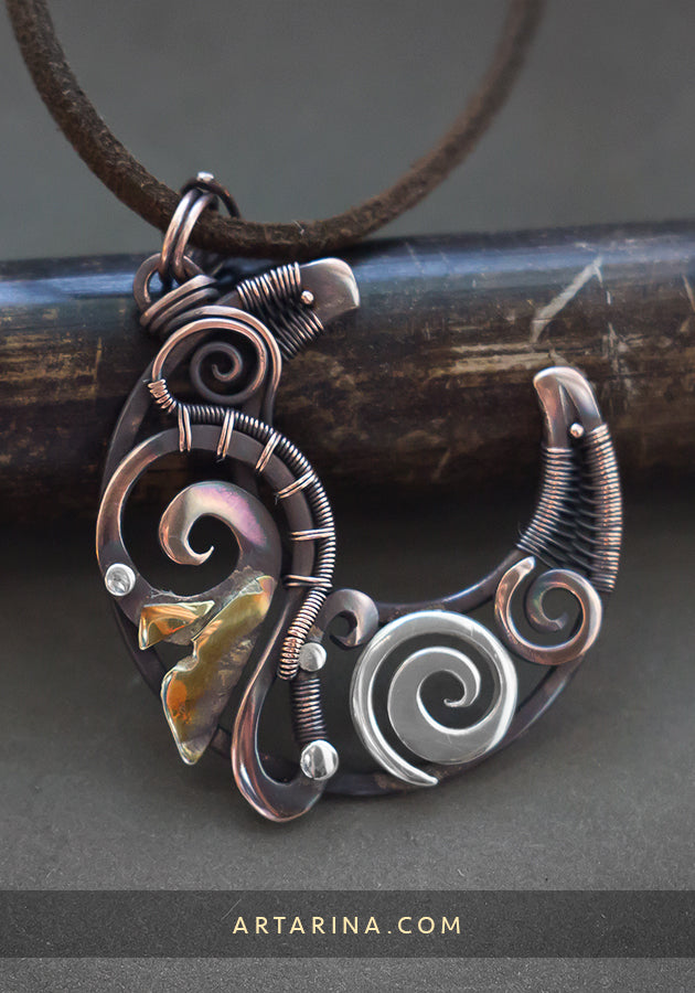 Wire wrapped crescent moon pendant