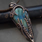 Copper wire wrapped man pendant with labradorite.
