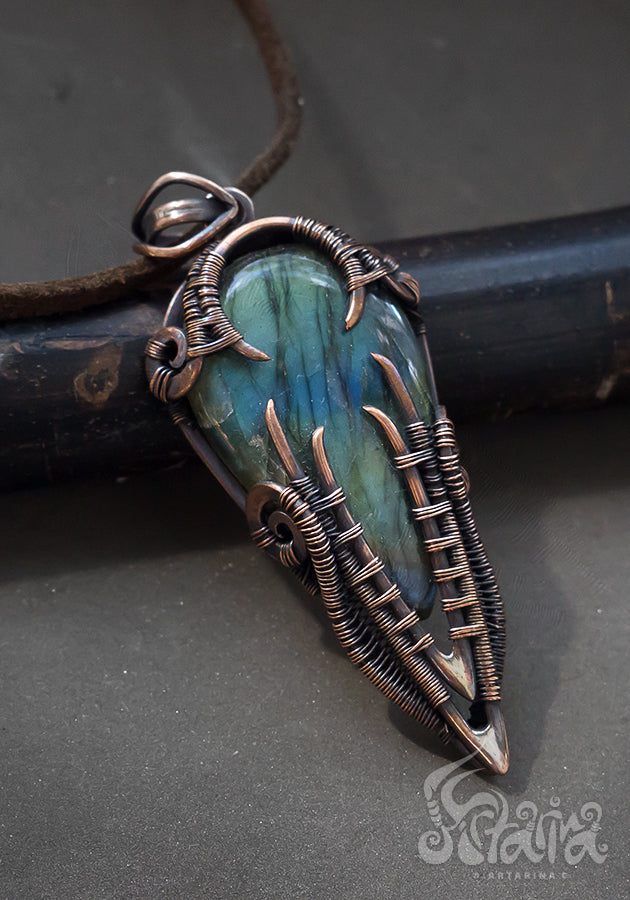 Copper wire wrapped man pendant with labradorite.