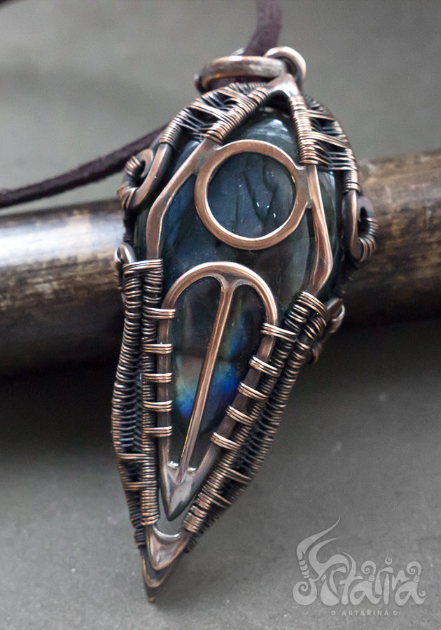 Copper wire wrapped man pendant with labradorite. 