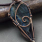 Copper wire wrapped man pendant with labradorite. 