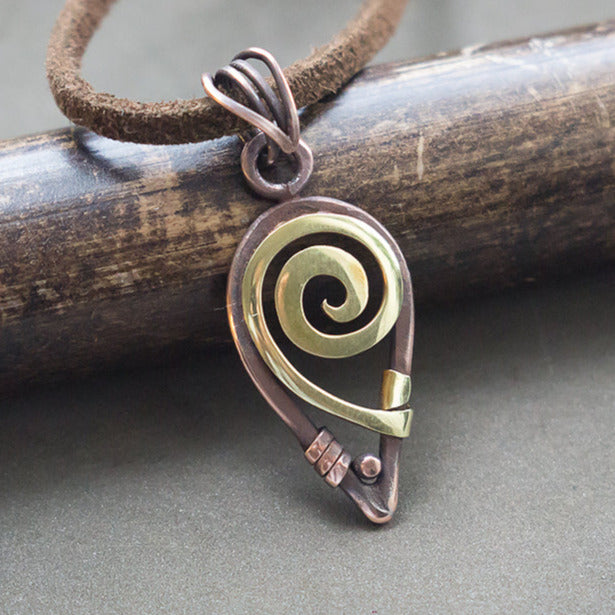 Golden color spiral wire wrapped Filigree pendant Small spiral shaped copper wire wrapped simple necklace Small copper wire wrapped pendant Minimalist designer wire wrap jewelry Unique oxidized copper crystal necklace by artarina