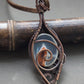 back side of agate wire wrapped necklace pendant