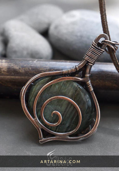 back side Mysterious amulet wire wrapped necklace made from brown copper, sterling silver and green labradorite.