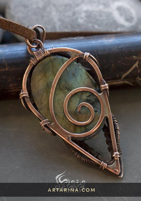 Witch pendant with flashy golden green labradorite back side of necklace