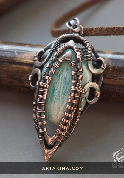 Copper wire wrapped pendant with amazonite.