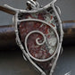back side of sterling silver pendant with unique pattern crazy lace agate gemstone