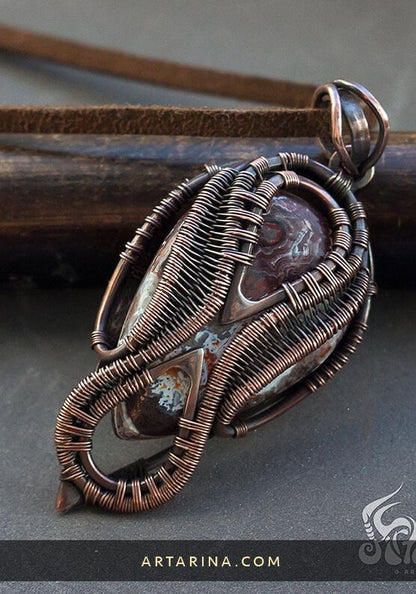 Copper wire wrapped pendant with crazy lace agate