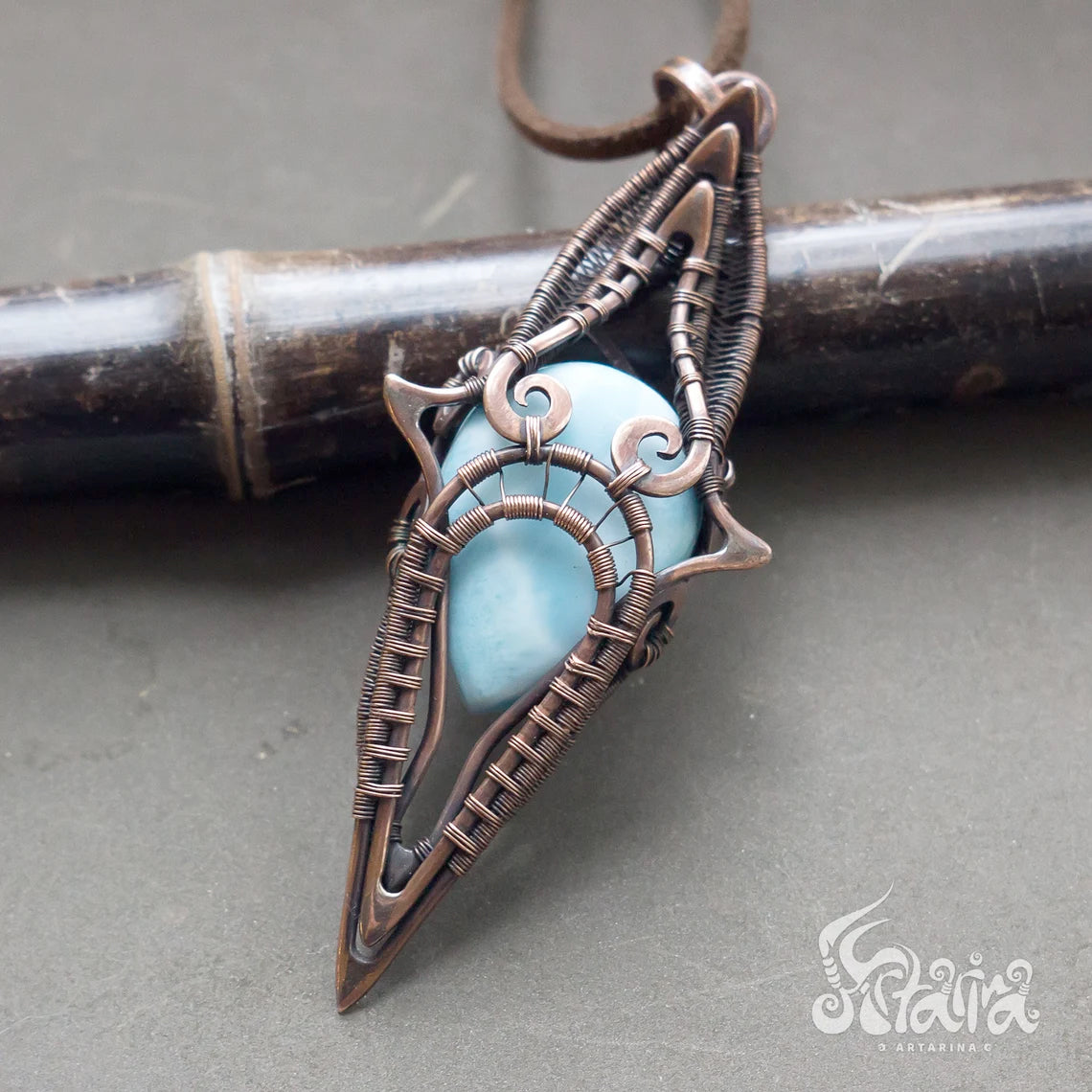 Larimar wire wrapped pendant. Wirework light blue gemstone necklace