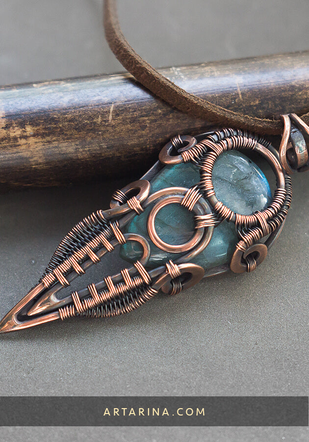 Sci fi blue stone pendant necklace